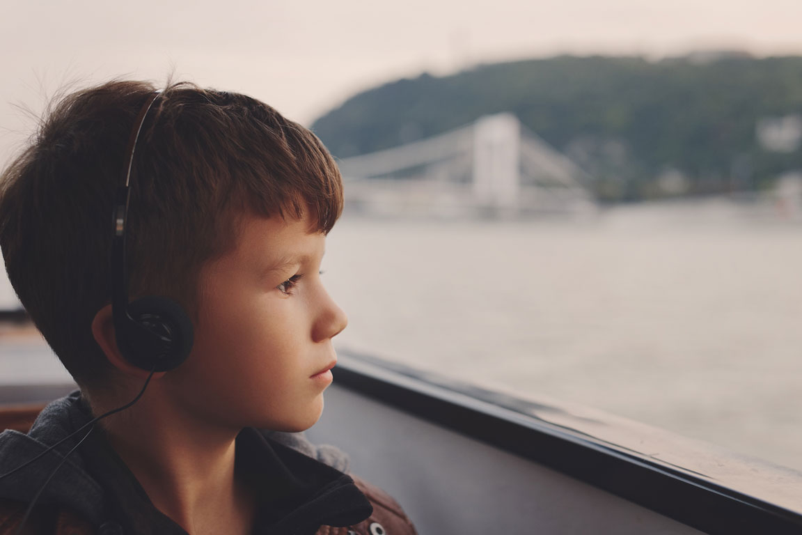 autistic child wearing headphones